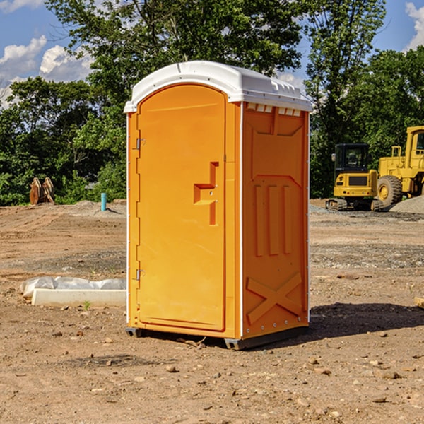 how often are the porta potties cleaned and serviced during a rental period in Benton